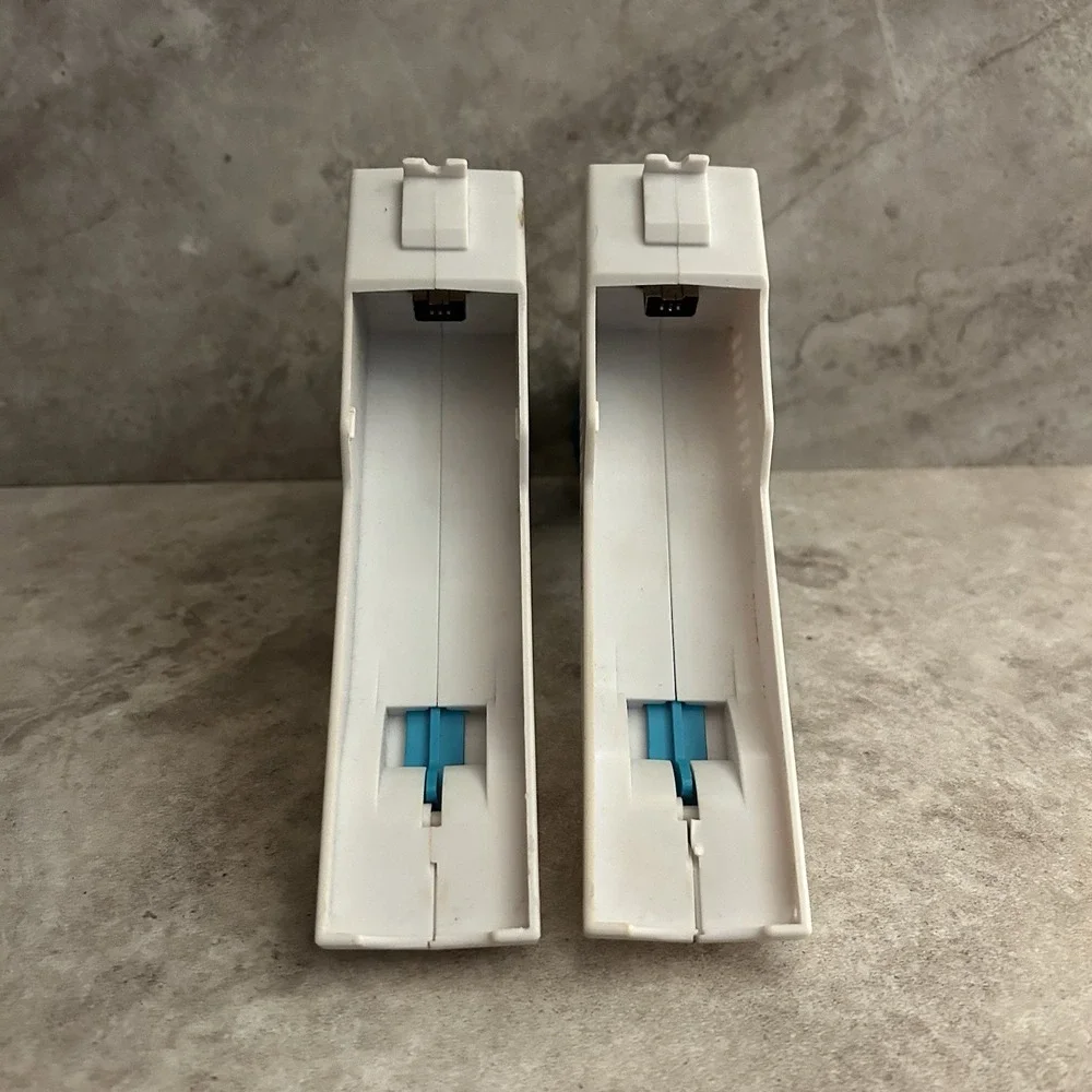 Nyko Perfect Shot Gun Controller White Blue Orange for Nintendo Wii Remote Pair